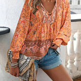 アリヤ - 花柄のエレガントなブラウス