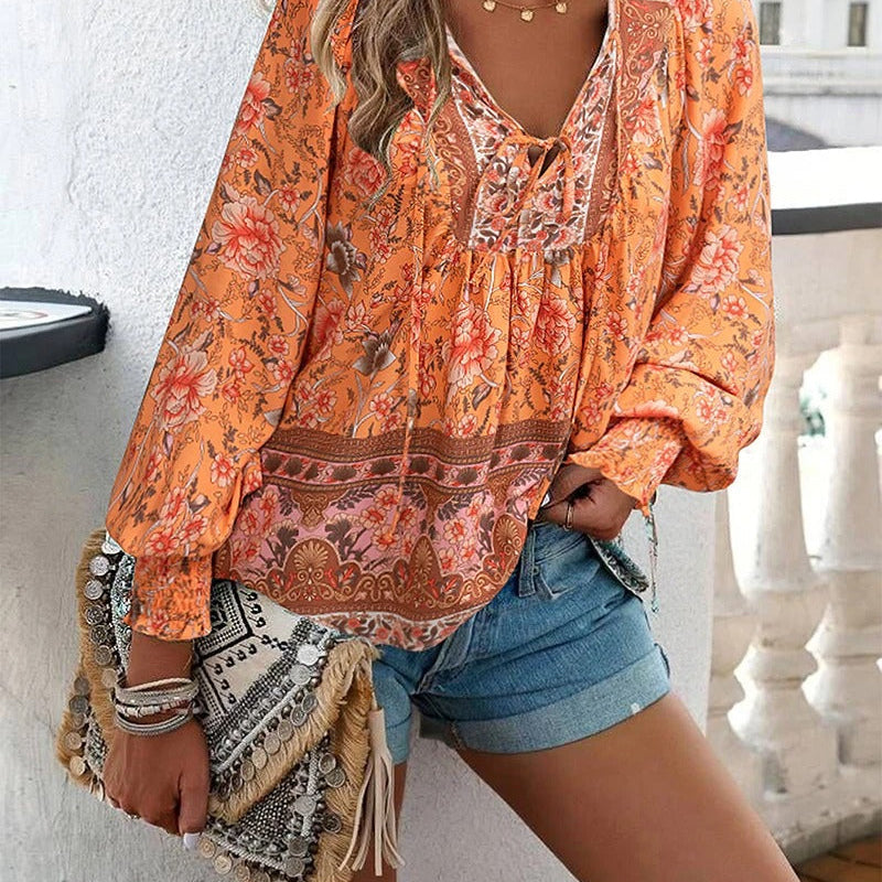 アリヤ - 花柄のエレガントなブラウス