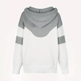 ピンクのカラーブロックデザインのプルオーバー、ドローストリング付きフード