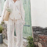 エレガントなスティックパンツセットと長袖ブラウス