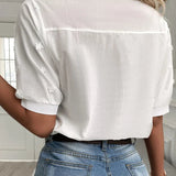 アンドレア™ | Vネックのシックなブラウス