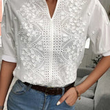 アンドレア™ | Vネックのシックなブラウス