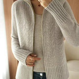 ミラ - ピーチカラーのジッパー付きVネックニットセーター